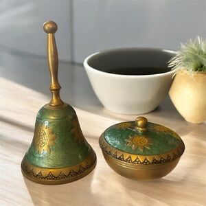 vintage brass hand bell and a small trinket box